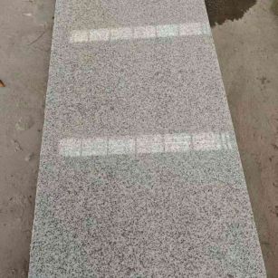 宣城芝麻白光面毛板